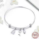 Adjustable key and lock bracelet