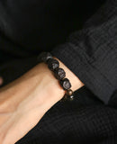 Hand Shaped Ebony Mixed With Obsidian