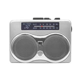 Dual speaker stereo retro cassette player cassette player listening to AM FM radio