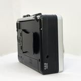 Dual speaker stereo retro cassette player cassette player listening to AM FM radio