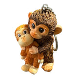3D Resin Monkey Keyring Charm Pendant Lightweight Cute Monkey Holding Plush Pendant for Women Girls Backpack Purse Car Keys