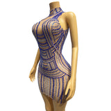 Female singer stage name ethnic style dress distinctive sapphire blue sparkling diamond pattern, tight fitting and sexy short skirt with buttocks
