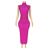 A sexy long dress with new style that is not transparent full of diamonds. It has a sleeveless and buttocks wrapped around the waist